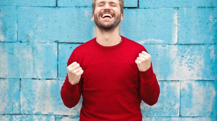 man in red crew neck sweatshirt photography