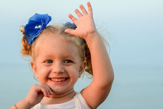 girl-baby-happy-waving-child-cute.jpg