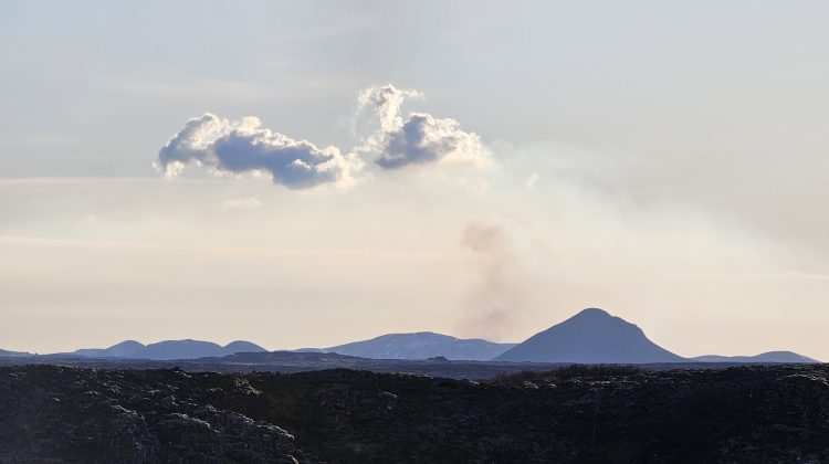 Mount Keilir in Iceland with volcanic cloud in background